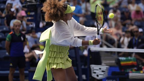 Naomi Osaka, of Japan, warms up before playing against Jelena Ostapenko, of Latvia, during the first round of the U.S. Open tennis championships, Tuesday, Aug. 27, 2024, in New York. (AP Photo/Seth Wenig)