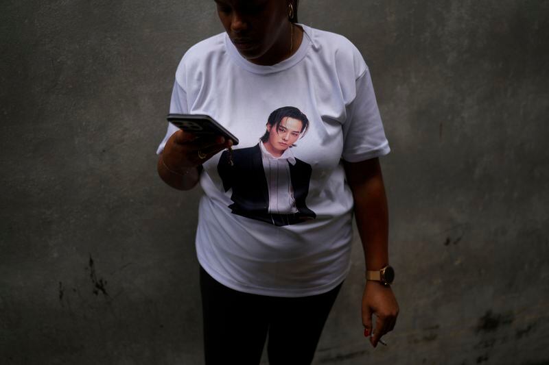 A K-pop follower wears a shirt displaying the image of singer G-Dragon, of Korean band Big Bang, at a cultural house in Havana, Cuba, Saturday, Sept. 7, 2024. (AP Photo/Ramon Espinosa)