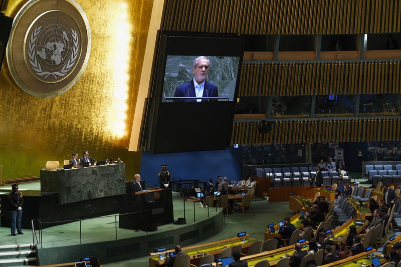 Masoud Pezeshkian, President of Iran, addresses the 79th session of the United Nations General Assembly at United Nations headquarters, Tuesday, Sept. 24, 2024. (AP Photo/Seth Wenig)