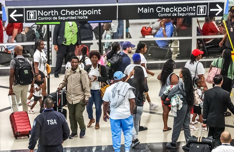 Pre-Labor Day travelers at Hartsfield-Jackson International Airport.