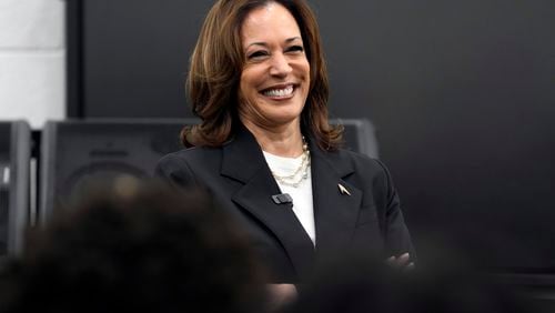 Democratic presidential nominee Vice President Kamala Harris speaks to marching band members at Liberty County High School in Hinesville, Ga., Wednesday, Aug. 28, 2024. (AP Photo/Jacquelyn Martin)