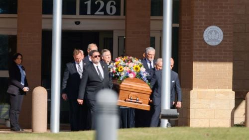 U.S. Secret Service agents carry former first lady Rosalynn Carter's casket from Phoebe Sumter Medical Center to her motorcade on Monday, Nov. 27, 2023. 
Miguel Martinez /miguel.martinezjimenez@ajc.com