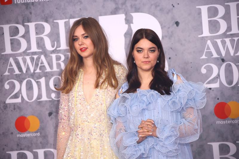Singers Klara Soderberg, left, and Johanna Sderberg from the band 'First Aid Kit' pose for photographers upon arrival at the Brit Awards in London, Wednesday, Feb. 20, 2019. (Photo by Joel C Ryan/Invision/AP)