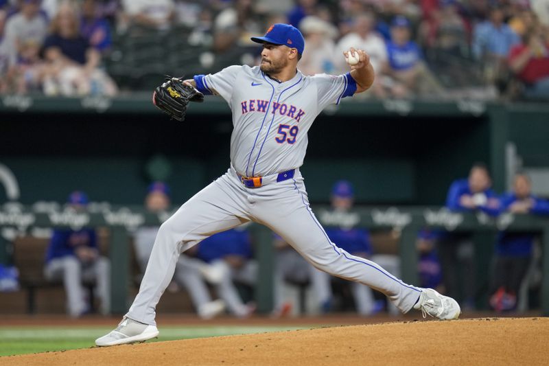New York Mets pitcher Sean Manaea throws a pitch to the Texas Rangers during the first inning of a baseball game, Wednesday, June 19, 2024, in Arlington, Texas. (AP Photo/Julio Cortez)