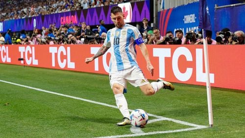Argentina forward Lionel Messi (10) takes a corner kick during  in the second half of the Copa America match against Canada at Mercedes-Benz Stadium on Thursday, June 20, 2024.

(Miguel Martinez / AJC)