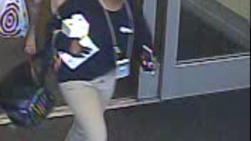 Police say this woman pretended to be a Target employee and stole more than $11,000 worth of iPhones in DeKalb County.