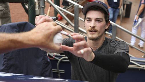 Atlanta Braves starting pitcher Max Fried signs autographs for fans before their game against the Miami Marlins at Truist Park, Friday, June 30, 2023, in Atlanta. Jason Getz / Jason.Getz@ajc.com)