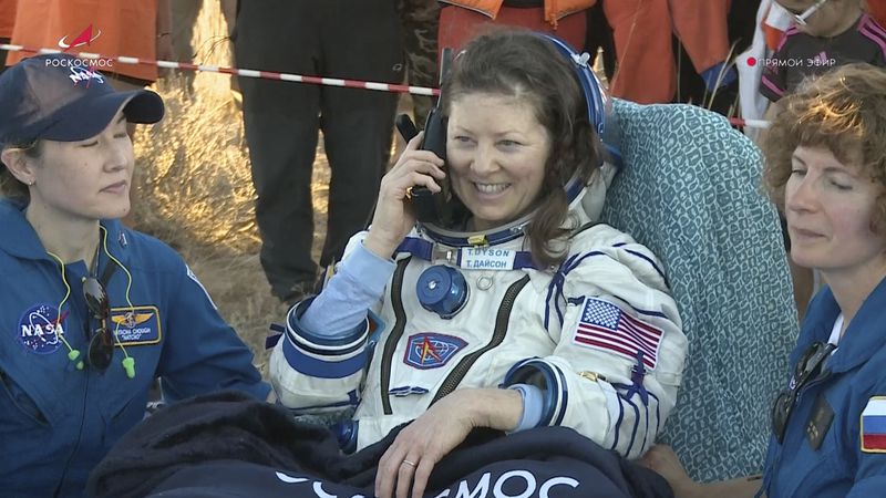 In this photo taken from video released by Roscosmos space corporation, the NASA astronaut Tracy Dyson speaks on a phone shortly after the landing of the Russian Soyuz MS-25 space capsule carrying the NASA astronaut Tracy Dyson and the Roscosmos cosmonauts Oleg Kononenko and Nikolai Chub, south-east of the Kazakh town of Zhezkazgan, Kazakhstan, Monday, Sept. 23, 2024. (Roscosmos space corporation via AP)