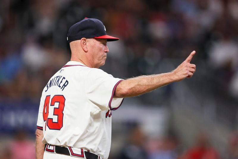 Atlanta Braves manager Brian Snitker calls for a new pitcher during the eighth inning against the San Francisco Giants at Truist Park, Tuesday, July 2, 2024, in Atlanta. The Braves lost to the Giants 5-3. (Jason Getz / AJC)

