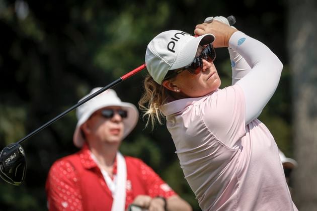 Lauren Coughlin, of the United States, hits a tee shot on the seventh hole during the second round at the LPGA Canadian Women's Open golf tournament in Calgary, Alberta, Friday, July 26, 2024. (Jeff McIntosh/The Canadian Press via AP)