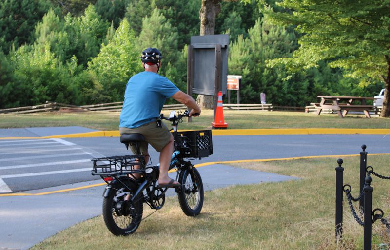 Andy Thurmond rides away at Kennesaw Mountain National Battlefield Park on Monday, July 1, 2024. Several cyclists came to voice their concerns to the National Park Service over its proposed plans to limit bike access to Kennesaw Mountain Road. (Taylor Croft/taylor.croft@ajc.com)