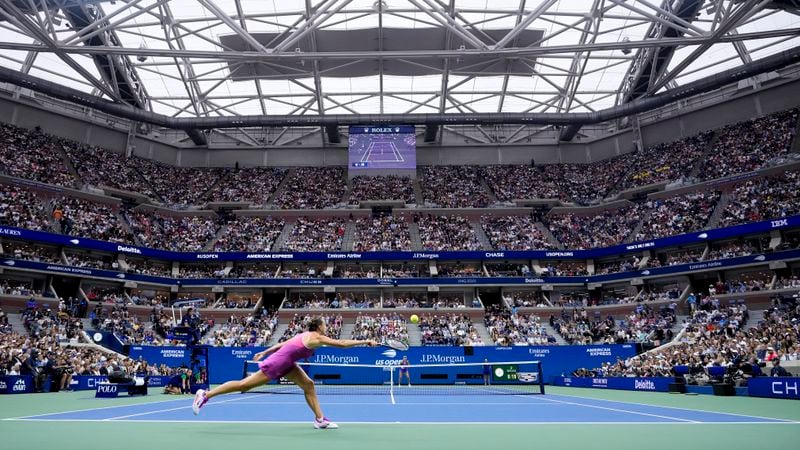 Aryna Sabalenka, of Belarus, can't catch up with a shot from Jessica Pegula, of the United States, during the women's singles final of the U.S. Open tennis championships, Saturday, Sept. 7, 2024, in New York. (AP Photo/Seth Wenig)