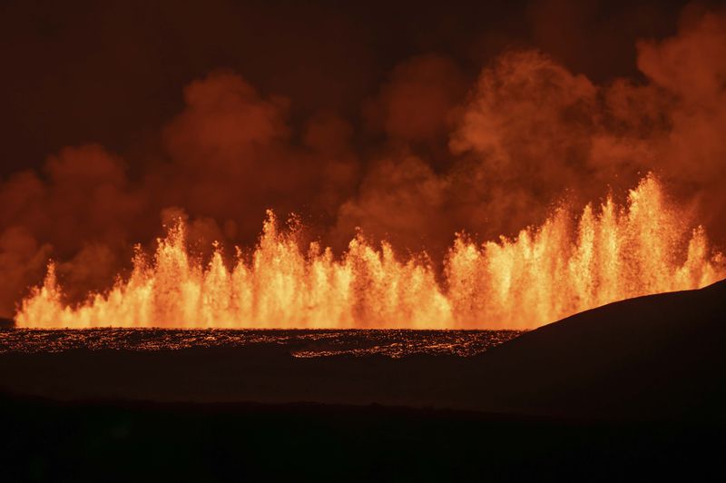 View of the lava fountains pouring out from the new eruptive fissure opened at Svartsengi volcanic system, Iceland, Thursday, Aug. 22, 2024, in a similar location as the previous eruptions. The fissure is 3 km north of Grindavik. (AP Photo/Marco di Marco)