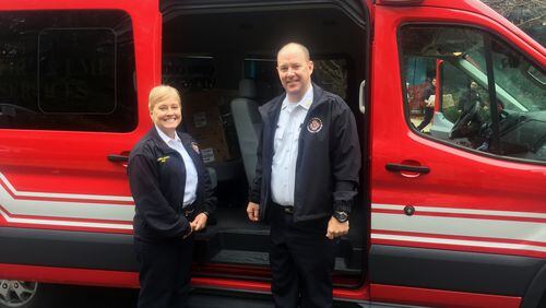 Fire officials from Cobb County load up their vehicle with free smoke detectors to give away in their communities.