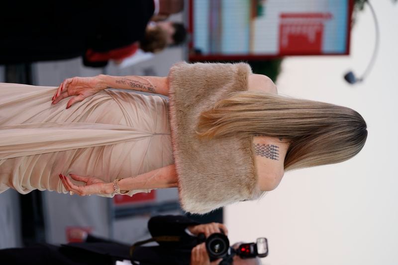 Angelina Jolie poses for photographers upon arrival for the premiere of the film 'Maria' during the 81st edition of the Venice Film Festival in Venice, Italy, on Thursday, Aug. 29, 2024. (Photo by Joel C Ryan/Invision/AP)