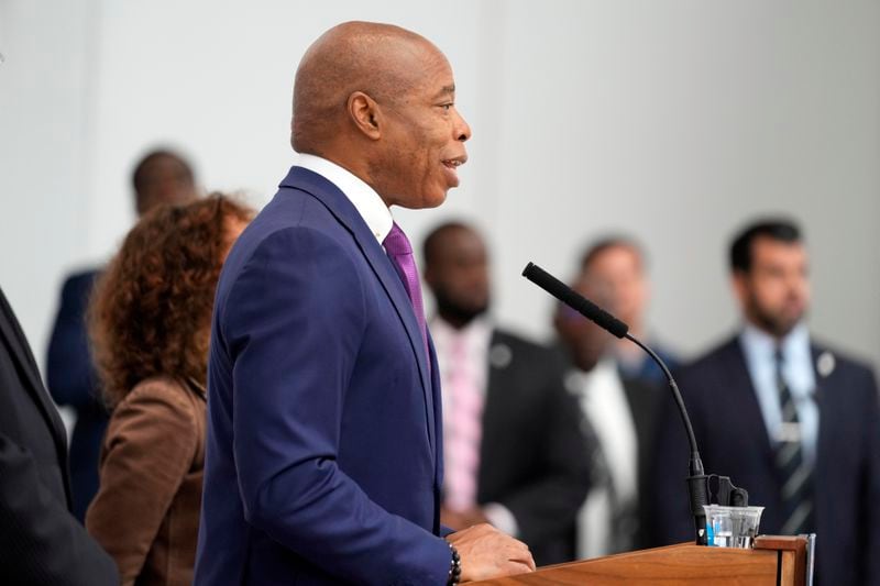 New York City Mayor Eric Adams speaks to reporters during a news conference in New York, Monday, Sept. 30, 2024. (AP Photo/Seth Wenig)