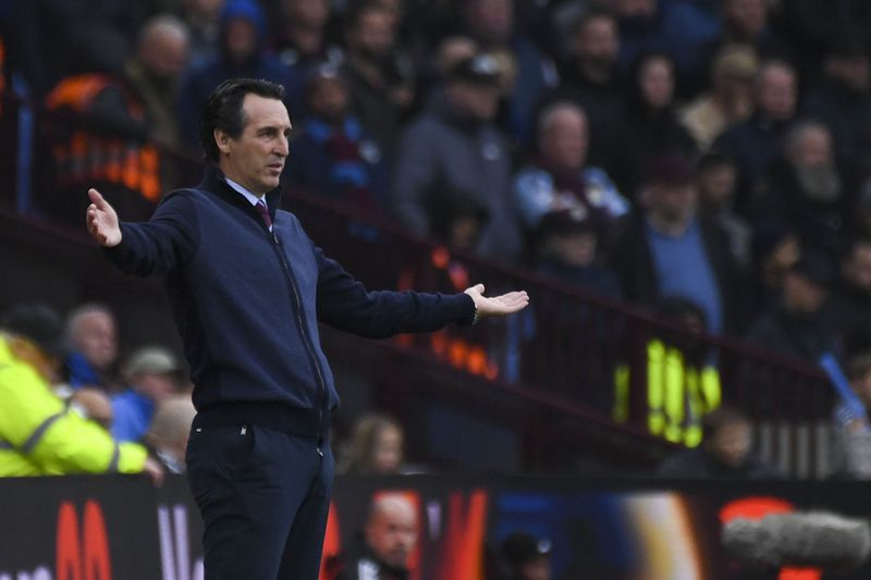 Aston Villa's head coach Unai Emery reacts during the English Premier League soccer match between Aston Villa and Manchester United, at Villa Park in Birmingham, England, Sunday, Oct. 6, 2024. (AP Photo/Rui Vieira)