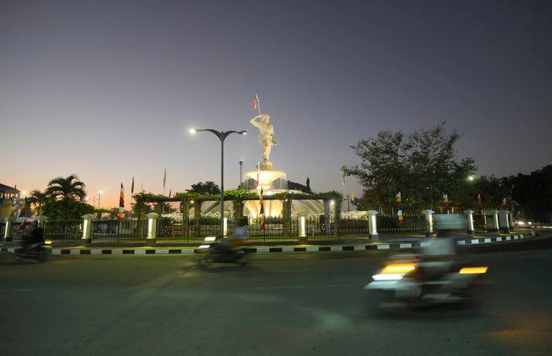 Streetlights are seen at sunset in Dili, East Timor Sunday, Sept. 8, 2024. (AP Photo/Firdia Lisnawati)