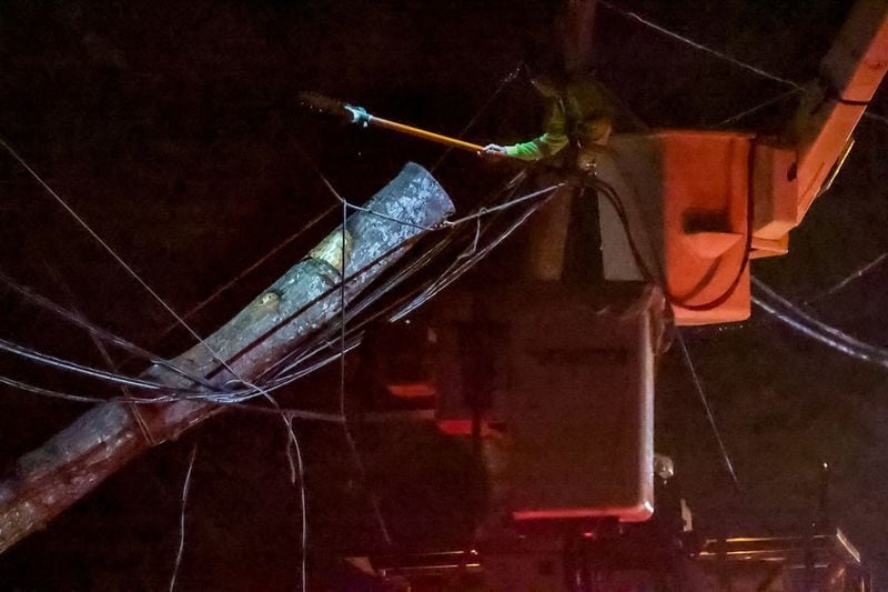 A fallen tree took out powerlines in DeKalb County's Woodland Hills neighborhood. 