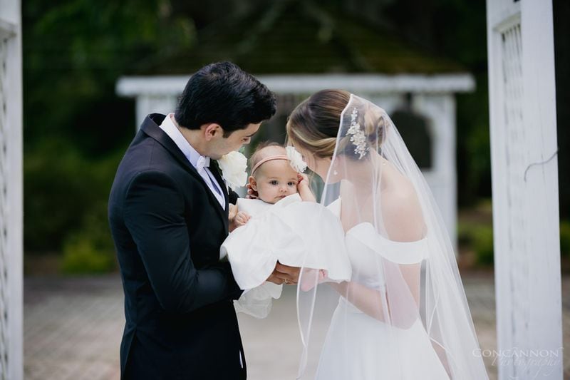 Globetrotting baby Alina joined her parents in two formal weddings in 2022 —  the first in Powder Springs, and the second in Spain. Courtesy of Ashley Concannon