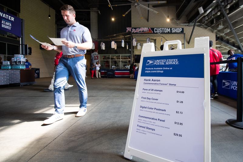 Hank Aaron stamp are seen on sale at the United State Postal Service Hank Aaron Commemorative Forever Stamp First Day of Issue Dedication Ceremony at Truist Park in Atlanta on Wednesday, July 31, 2024.  (Ziyu Julian Zhu / AJC)