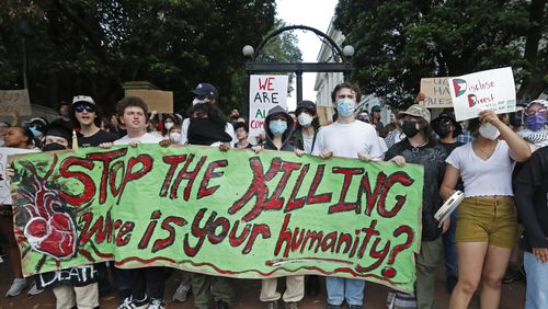 FILE - University of Georgia students march in front of the university arch in Athens, Ga., Friday, May 3, 2024, following the April 29, 2024, arrest of 16 students who tried to set up an encampment protesting the Israel-Hamas war. (Joshua L. Jones/Athens Banner-Herald via AP, File)/Athens Banner-Herald via AP, File)