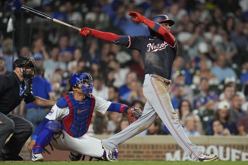 Washington Nationals' CJ Abrams hits a double during the third inning of a baseball game against the Chicago Cubs, Thursday, Sept. 19, 2024, in Chicago. (AP Photo/Erin Hooley)