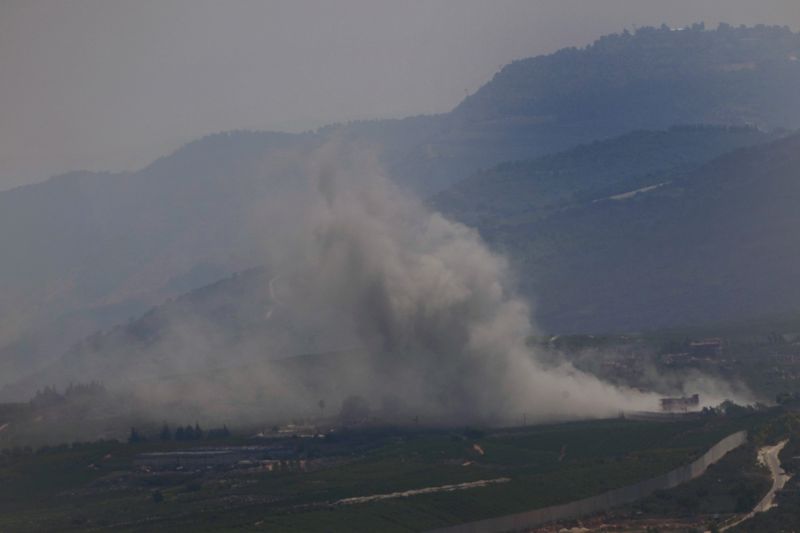 Smoke rises from an Israeli airstrike on Kfar Kila, a Lebanese border village with Israel in south Lebanon, as it seen from Marjayoun town in south Lebanon, Monday, Aug. 26, 2024. (AP Photo/Hussein Malla)