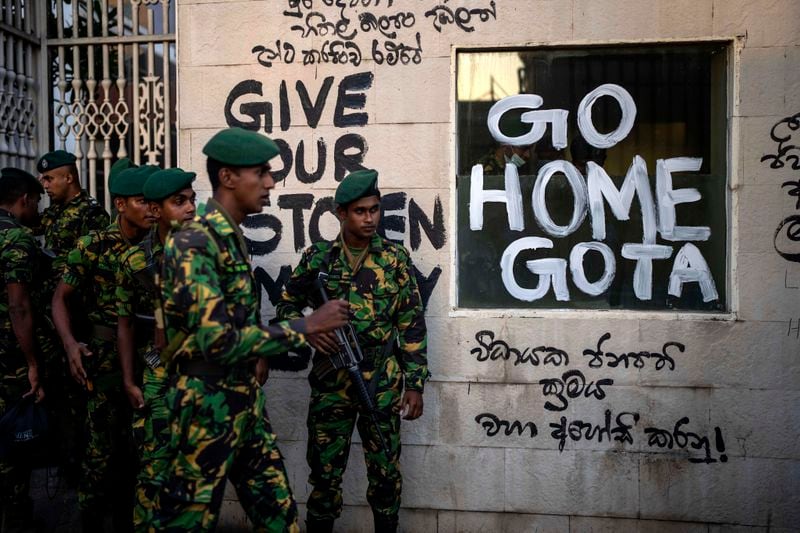 FILE - Sri Lanka army soldiers patrol near the official residence of president Gotabaya Rajapaksa three days after it was stormed by anti government protesters in Colombo in Colombo, Sri Lanka, Tuesday, July 12, 2022.(AP Photo/Rafiq Maqbool, File)