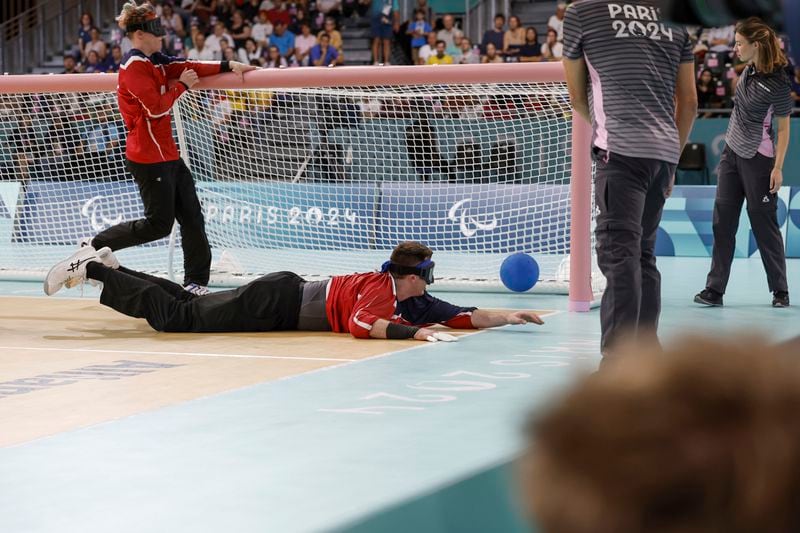 Calahan Young from the U.S. dives for a ball during a 13-8 loss to Brazil on Friday, August 30, 2024 at the South Paris Arena during the Paralympic Games in Paris. (AP Photo/Nathalee Simoneau)