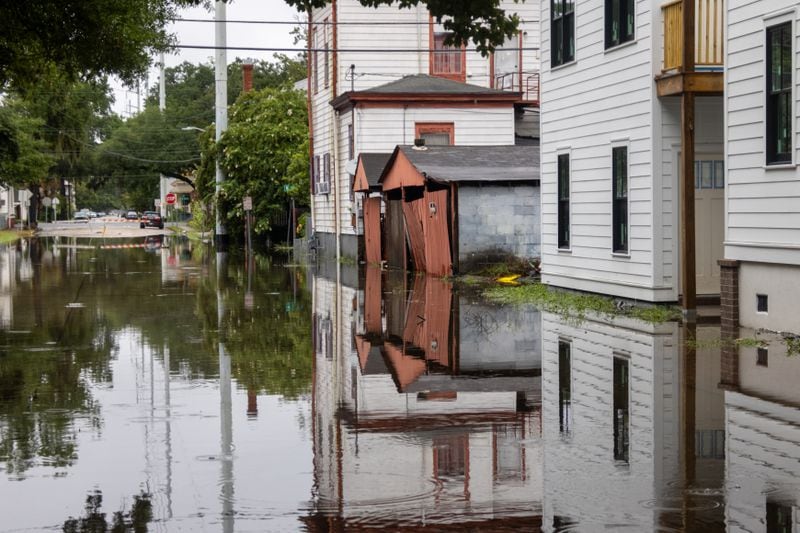 A closed off flooded street on Jefferson and W 38th street on Tuesday, August 6, 2024 in Savannah, GA. (AJC Photo/Katelyn Myrick)