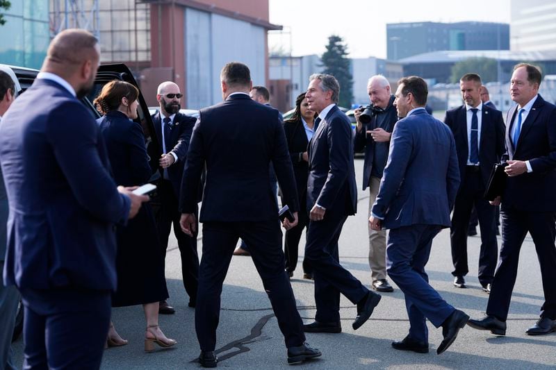 U.S. Secretary of State, Antony Blinken, center, arrives at Chopin Airport in Warsaw, Poland, Thursday, Sept. 12, 2024. (AP Photo/Mark Schiefelbein, Pool)