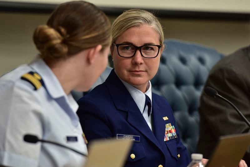 Lt. Cmdr. Nicole Emmons, U.S. Coast Guard Marine Board of Investigation technical advisor, center right, speaks with board members, Wednesday, Sept. 25, 2024, at the U.S. Coast Guard Marine Board of Investigation hearing into the June 2023 loss of the Titan submersible, in North Charleston, S.C. (Petty Officer 2nd Class Kate Kilroy/U.S. Coast Guard via AP, Pool)