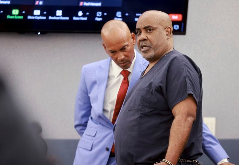 Duane "Keffe D" Davis, who is accused of orchestrating the 1996 slaying of hip-hop icon Tupac Shakur, right, talks to his attorney, Carl Arnold, in court at the Regional Justice Center in Las Vegas, Tuesday, June 25, 2024. (K.M. Cannon/Las Vegas Review-Journal via AP, Pool)