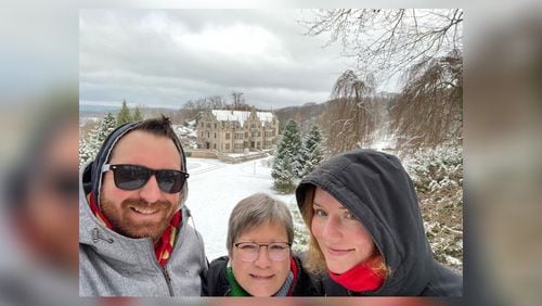 Doug Turnbull (left), his wife Momo (right), and her mom Ulrike Lesser (middle) pose during the season's first snow in Bad Liebenstein, Germany on December 10, 2022. DOUG TURNBULL / WSB TRIPLE TEAM TRAFFIC