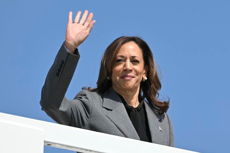 Democratic presidential nominee Vice President Kamala Harris waves as she boards Air Force Two, Friday, Sept. 20, 2024 at Joint Base Andrews, Md. Harris is traveling to Georgia for a campaign event. (Mandel Ngan/Pool via AP)