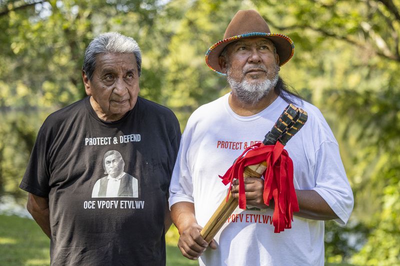 George Thompson, left, who is the Mekko, a ceremonial leader, of Hickory Ground in the Muscogee Nation, and Robyn Soweka Sr., of Hickory Ground Tribal Town, visited the Poarch Band tribe to challenge them to a game of stickball, a binding way of solving a dispute between tribes, Tuesday, Sept. 24, 2024, in Wetumoka, Ala. (AP Photo/Vasha Hunt)