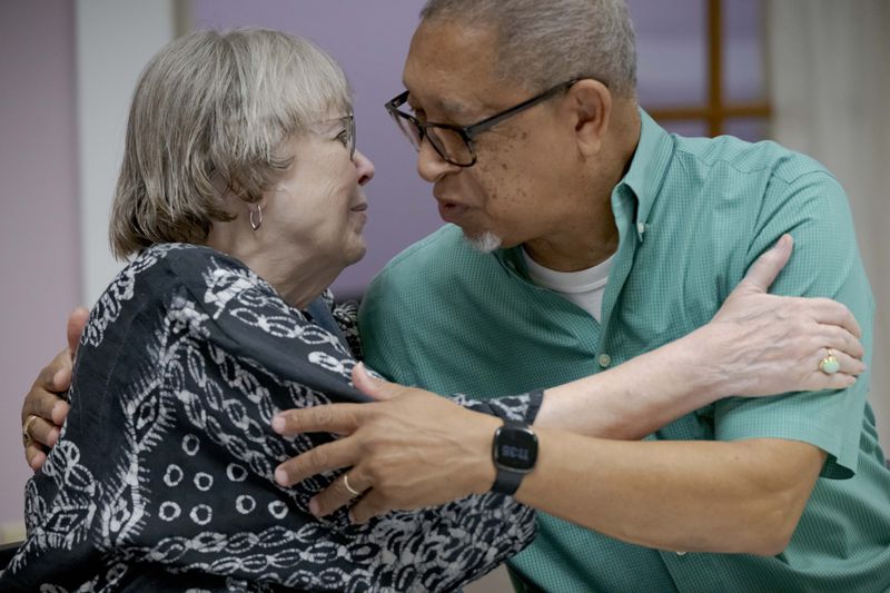 Martha Ward, left, and Kenneth Russell greet each other during Learning to be Elders class at the First Grace United Methodist Church in New Orleans, Wednesday, Sept. 25, 2024. (AP Photo/Matthew Hinton)