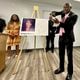 Ben Crump, the civil rights attorney representing the family of Sonya Massey, stands next to a diagram from the slain woman's autopsy on Friday, June 26, 2024, in Springfield, Ill., and gestures to show the downward angle in which Sangamon County Sheriff's Deputy Sean Grayson shot Massey in the face early on July 6. Massey had called 911 with suspicions of a prowler near her Springfield home. Grayson has pleaded guilty to first-degree murder and other charges. (AP Photo/John O'Connor)