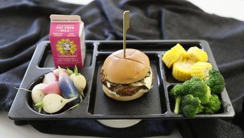 This sample plate was displayed at the burger station when Gwinnett County Public Schools’ school nutrition team hosted its fourth annual Taste of Cafe Gwinnett in 2019, during School Lunch Week. BOB ANDRES / ROBERT.ANDRES@AJC.COM