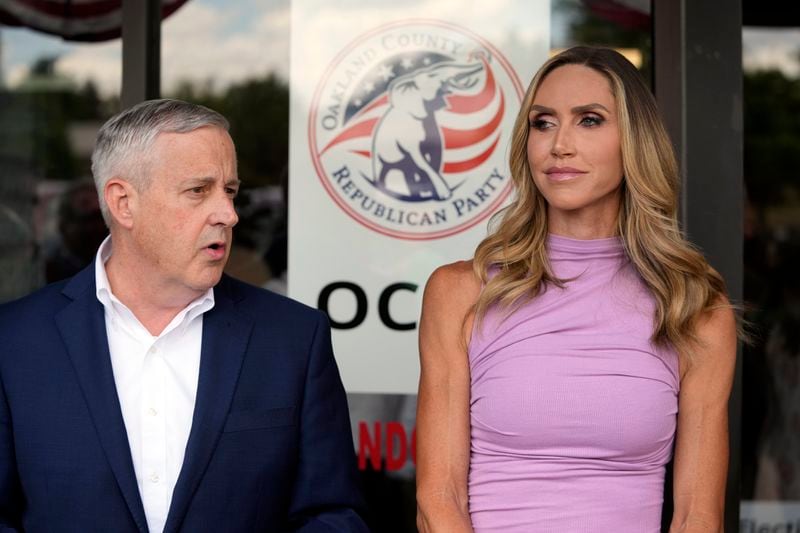 Republican National Committee co-chairs Michael Whatley and Lara Trump addresses the media at the Oakland County GOP Headquarters, Friday, June 14, 2024 in Bloomfield Hills, Mich. (AP Photo/Carlos Osorio)