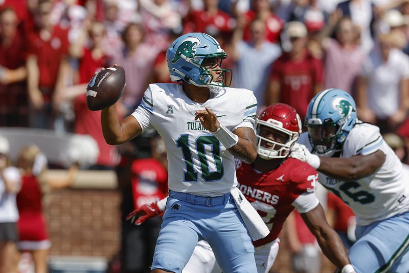 Tulane quarterback Darian Mensah (10) passes against Oklahoma during the first quarter of an NCAA college football game Saturday, Sept. 14, 2024, in Norman, Okla. (AP Photo/Alonzo Adams)