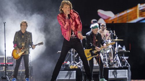 Mick Jagger , center, of The Rolling Stones, performs during the "Hackney Diamonds" tour on Friday in Atlanta.