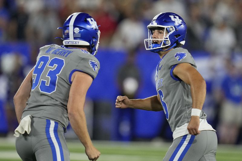 Kentucky place kicker Alex Raynor (16) reacts after kicking a field goal during the first half of an NCAA college football game against Georgia, Saturday, Sept. 14, 2024, in Lexington, Ky. (AP Photo/Darron Cummings)