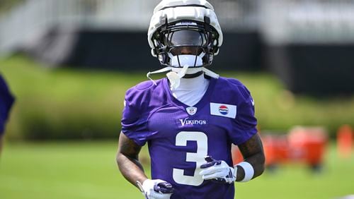 Minnesota Vikings wide receiver Jordan Addison warms up during NFL football training camp in Eagan, Minn., Wednesday, July 24, 2024. (AP Photo/Craig Lassig)