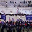 FILE - Violent protesters, loyal to President Donald Trump, storm the Capitol, Wednesday, Jan. 6, 2021, in Washington. (AP Photo/John Minchillo, File)