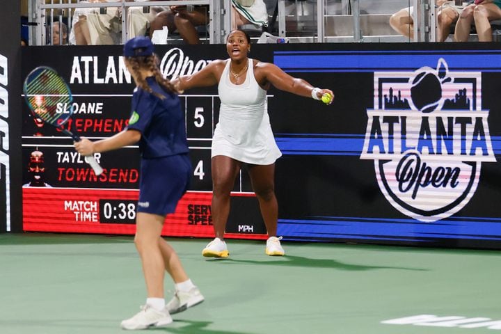 Taylor Townsend reacts with a ball boy after she won a point against Sloane Stephens during an exhibition match in the  Atlanta Open at Atlantic Station on Sunday, July 21, 2024, in Atlanta.
(Miguel Martinez / AJC)