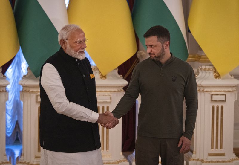 Indian Prime Minister Narendra Modi, left, meets with Ukrainian President Volodymyr Zelenskyy in Kyiv, Ukraine, on Friday, Aug. 23, 2024. (AP Photo/Efrem Lukatsky)