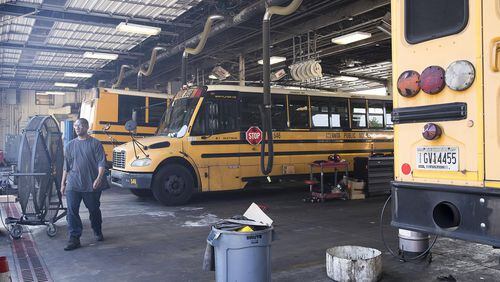 Atlanta Public Schools plans to swap out some of its diesel school buses with 25 electric buses. (Alyssa Pointer/AJC FILE PHOTO)
