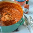 Mama’s Seafood Gumbo, a classic Creole recipe in Virginia Willis's newly updated "Bon Appetit, Y’all," is a thick tomato-based stew made with shrimp and crab. (Courtesy)